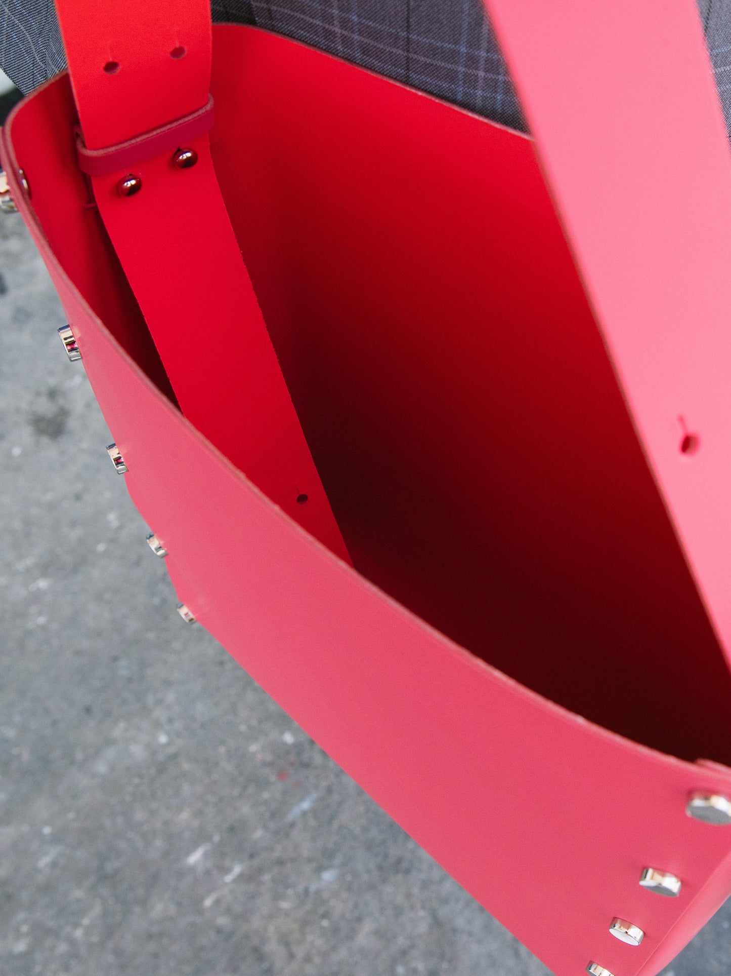Chic red tote and bucket bag crafted from Italian vegetable tanned leather for a minimal yet sophisticated look.