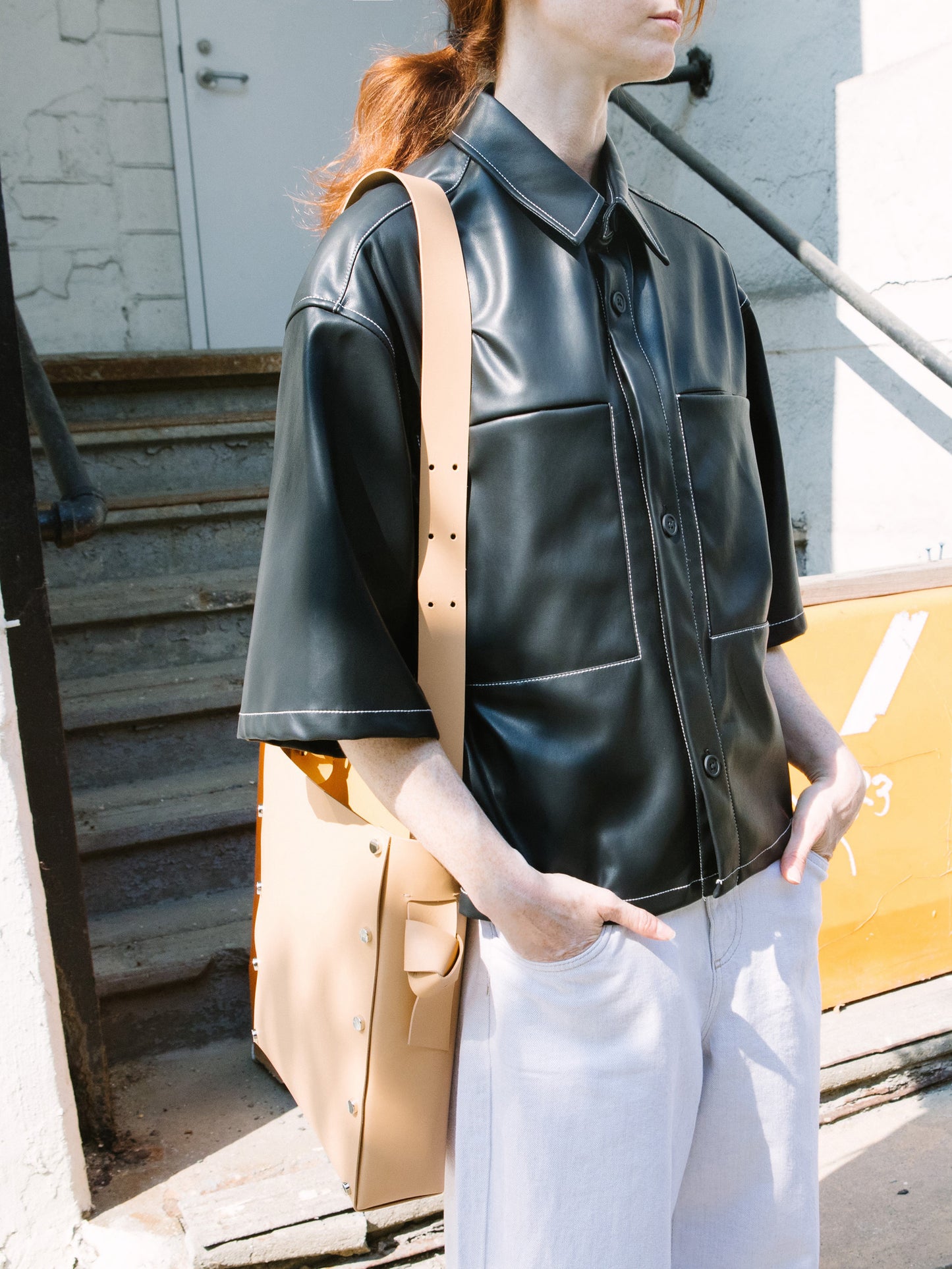 Chic beige tote and bucket bag crafted from Italian vegetable tanned leather for a minimal yet sophisticated look.