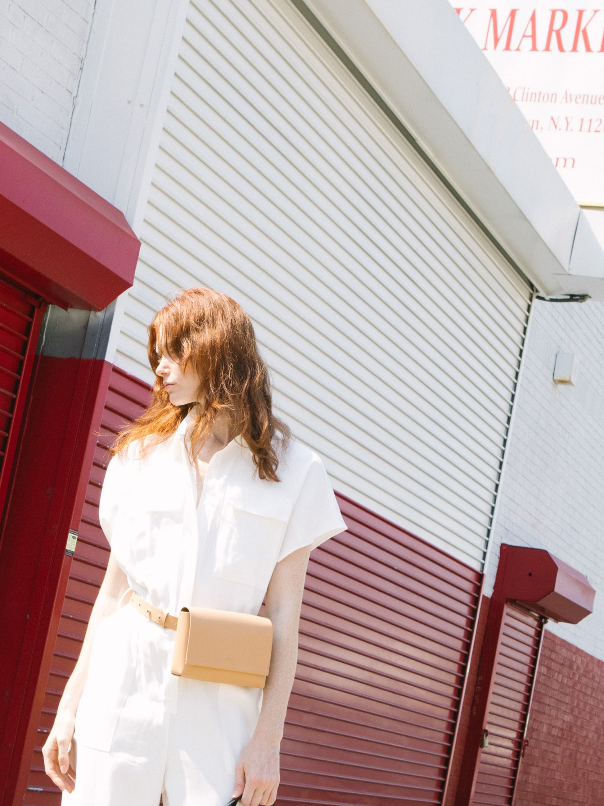 Chic beige designer belt bag and fanny pack crafted from Italian vegetable tanned leather for a minimalist yet sophisticated look.
