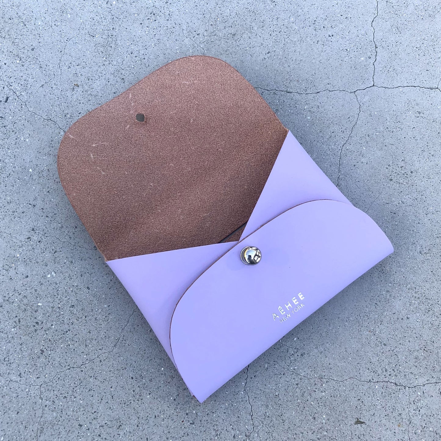 Chic lavender cardholder wallet crafted from Italian vegetable tanned leather for a minimal yet sophisticated look.